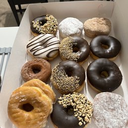 a dozen donuts in a box