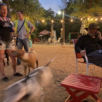 Doghouse Drinkery Dog Park - Outdoor seating with space for dogs to run around and play - Dog Parks Near Me - Leander, Texas Doghouse Drinkery Dog Park - Outdoor seating with space for dogs to run around and play - Dog Parks Near Me - Leander, Texas