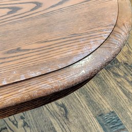 Closeup of damaged appearance of our dining table Closeup of damaged appearance of our dining table