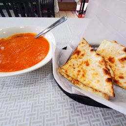 Butter chicken, plain naan Butter chicken, plain naan