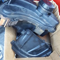 County Line Mower Center - Gas tank, carburator, and other parts not put back together.