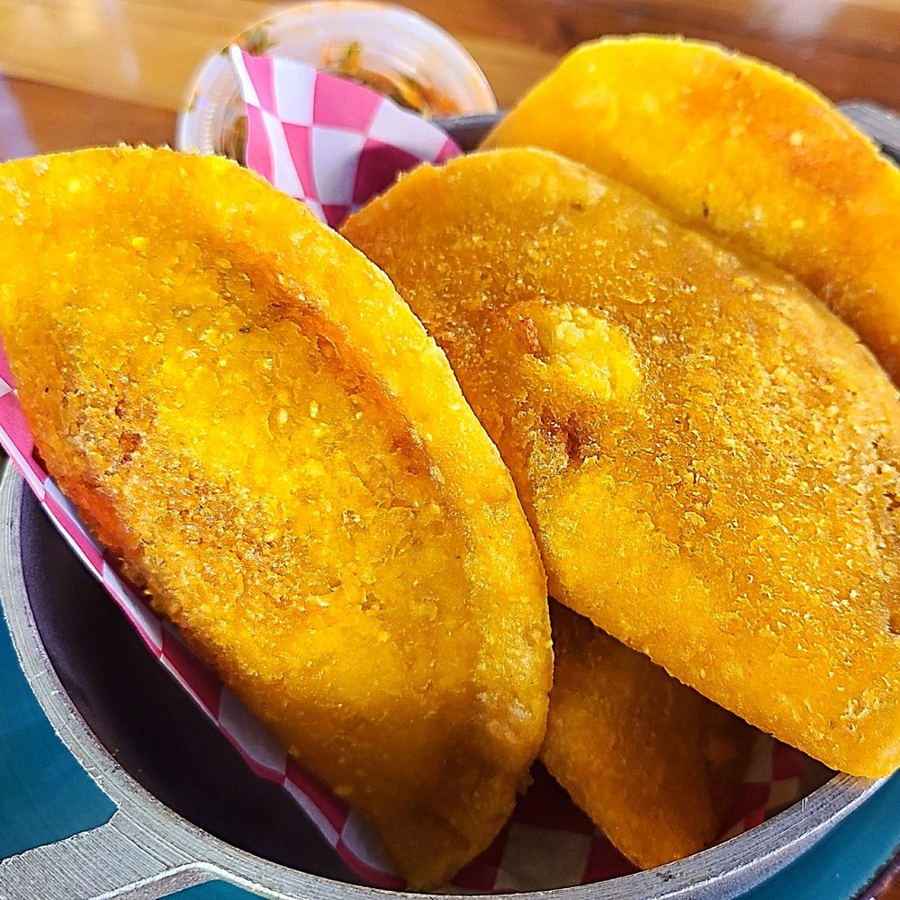 Simon Parrilla Bar & Grill - Beef Empanadas appetizer - $8.95 - Colombian Near Me - Orlando, Florida Simon Parrilla Bar & Grill - Beef Empanadas appetizer - $8.95 - Colombian Near Me - Orlando, Florida