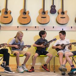 Aspen Academy - Aspen Academy students in music class, playing ukuleles.