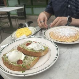 Avocado Toast ($14), Buttermilk Stack ($10), Side of Eggs ($3)