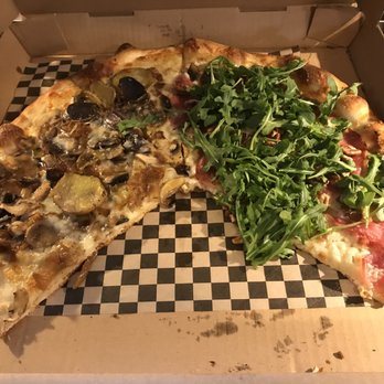 Wicked Pies - Pizza with two slices gone. Half White Lodge. Half Laura Palmer. - Pizza Near Me - Olympia, Washington Wicked Pies - Pizza with two slices gone. Half White Lodge. Half Laura Palmer. - Pizza Near Me - Olympia, Washington