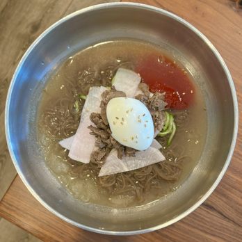Sudam Bunsik - "Bibim Naengmyeon": Spicy Cold Buckwheat Noodles ($22) - served mul naengmyeon w/ squirt of spicy sauce - Korean Near Me - Mountain View, California Sudam Bunsik - "Bibim Naengmyeon": Spicy Cold Buckwheat Noodles ($22) - served mul naengmyeon w/ squirt of spicy sauce - Korean Near Me - Mountain View, California