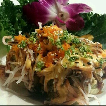 Mika Sushi - Mike ball. Under all that there is fried avocado stuffed with spicy tuna and salmon. - Japanese Near Me - Arvada, Colorado