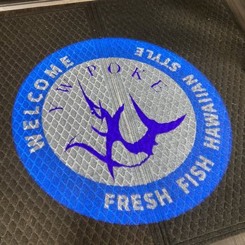 Yw Poke - The projected logo at the front door. - Hawaiian Near Me - Bentonville, Arkansas Yw Poke - The projected logo at the front door. - Hawaiian Near Me - Bentonville, Arkansas