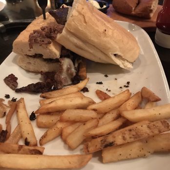 LongHorn Steakhouse - Shaved prime rib sandwich and fries - Steakhouses Near Me - Newnan, Georgia