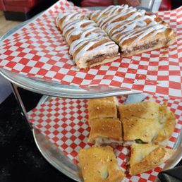 Cinnamon and frosted dessert and ham and cheese Stromboli Cinnamon and frosted dessert and ham and cheese Stromboli
