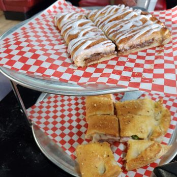 Pizza Inn - Cinnamon and frosted dessert and ham and cheese Stromboli - Pizza Near Me - Duncanville, Texas Pizza Inn - Cinnamon and frosted dessert and ham and cheese Stromboli - Pizza Near Me - Duncanville, Texas