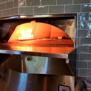 Flying Tomato - Fire oven grill baking pizza - Diners Near Me - Spanaway, Washington