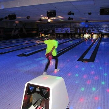 Odyssey Fun Center - a young boy playing bowling - Bowling Near Me - Sheboygan Falls, Wisconsin Odyssey Fun Center - a young boy playing bowling - Bowling Near Me - Sheboygan Falls, Wisconsin