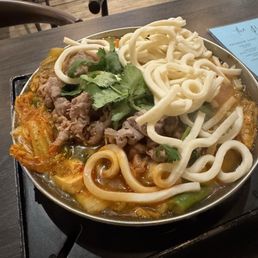 Flaming Spicy Pot, add udon. (Udon came on the side) Flaming Spicy Pot, add udon. (Udon came on the side)