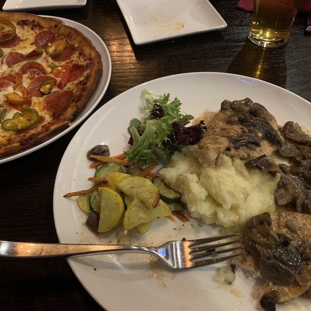 Chicken Marsala and pizza Chicken Marsala and pizza