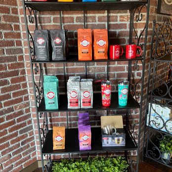 Scooter's Coffee - a shelf of coffees - Coffee & Tea Near Me - Roy, Utah Scooter's Coffee - a shelf of coffees - Coffee & Tea Near Me - Roy, Utah