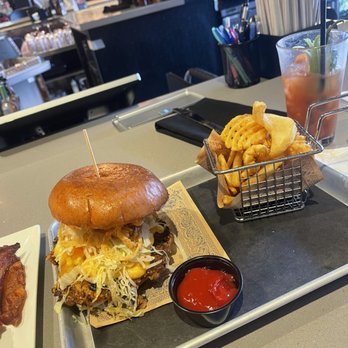 Guy Fieri's Branson Kitchen + Bar - Veggie burger with Mac and cheese - Bars Near Me - Branson, Missouri Guy Fieri's Branson Kitchen + Bar - Veggie burger with Mac and cheese - Bars Near Me - Branson, Missouri