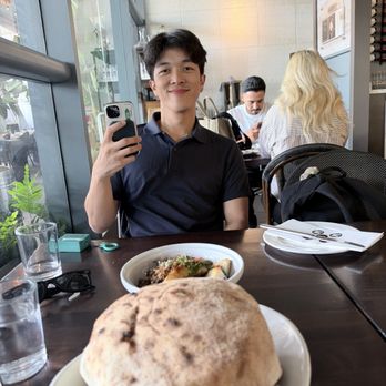 Terrace by Mix Mix - Son enjoying our "fusion" Filipino meal! - New American Near Me - Costa Mesa, California Terrace by Mix Mix - Son enjoying our "fusion" Filipino meal! - New American Near Me - Costa Mesa, California