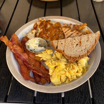 Toast - Two eggs your way with bacon, hash browns and wheat toast. Yummy! - Breakfast & Brunch Near Me - Temecula, California