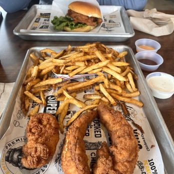 Super Chix - 3 fried strips, Cajun seasoned fries, deluxe sandwich, ranch dressing, classic sauce and Korean BBq sauce - Chicken Shop Near Me - Birmingham, Alabama Super Chix - 3 fried strips, Cajun seasoned fries, deluxe sandwich, ranch dressing, classic sauce and Korean BBq sauce - Chicken Shop Near Me - Birmingham, Alabama