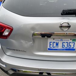 Budget - Smashed tailgate and expired tag date