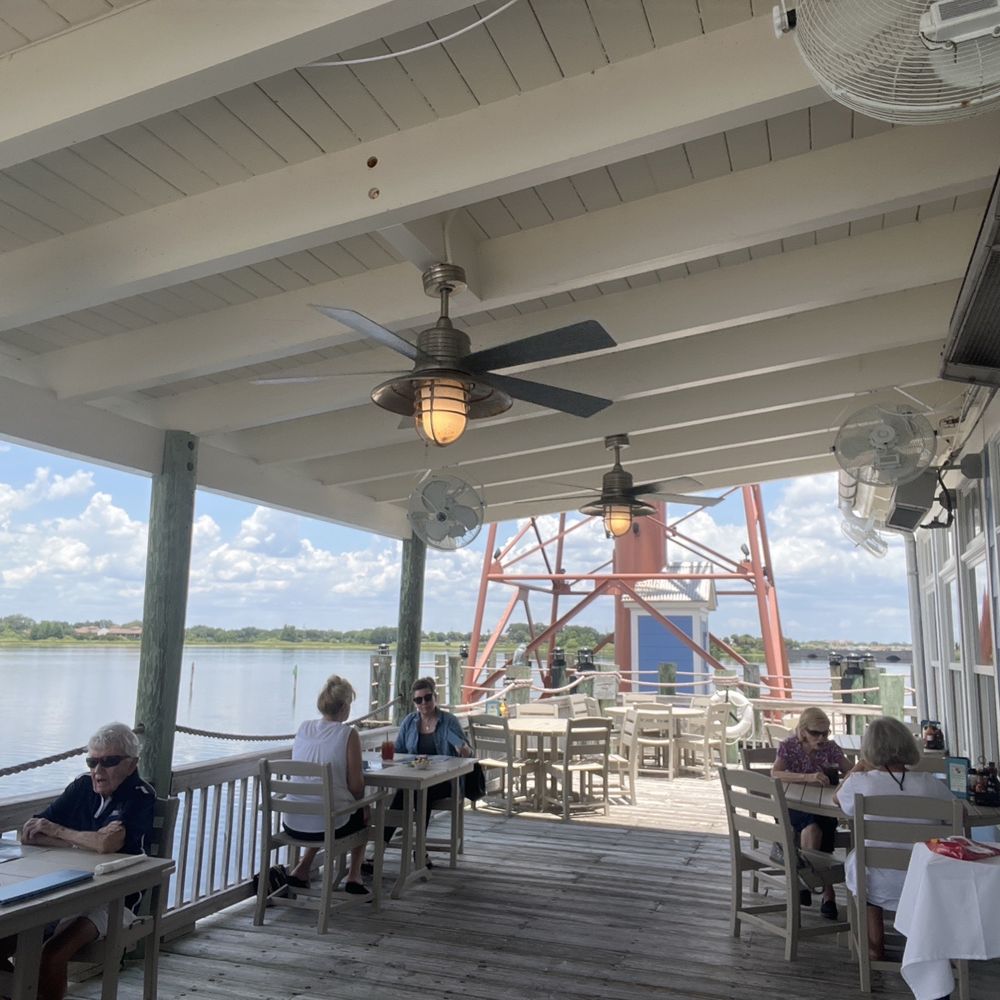 Lighthouse Point Bar & Grill - Outside patio with lake view. - Seafood Near Me - The Villages, Florida