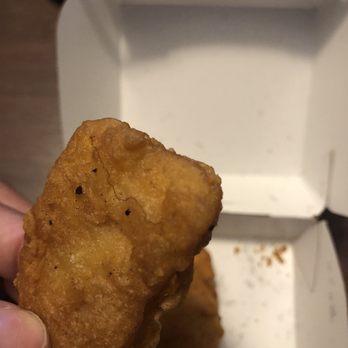 McDonald's - a hand holding a piece of fried food - Fast Food Near Me - Keaau, Hawaii McDonald's - a hand holding a piece of fried food - Fast Food Near Me - Keaau, Hawaii