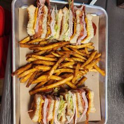 Gullo's Fresh Produce & Bake Shop - Club sandwich with Cajun fries.