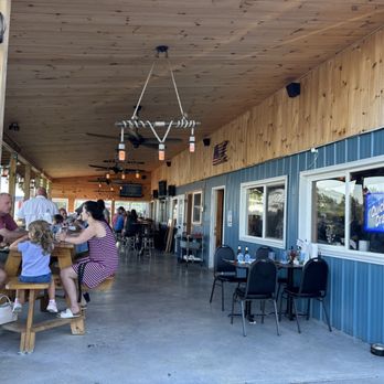 Snug Harbor Restaurant & Bar - Outdoor seating - Bars Near Me - Cape Vincent, New York Snug Harbor Restaurant & Bar - Outdoor seating - Bars Near Me - Cape Vincent, New York