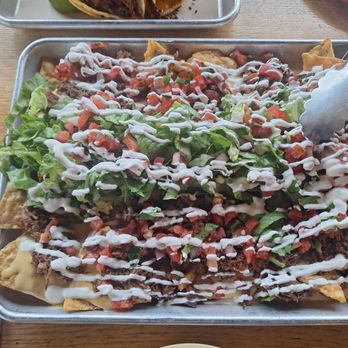 Avenue American Bistro - Brisket nachos - Sports Bars Near Me - Wayne, Michigan