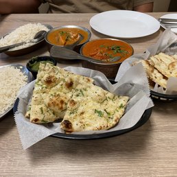 Garlic naan, regular naan, chicken tikka masala and chicken makhani (aka: butter chicken)... soooo good! Garlic naan, regular naan, chicken tikka masala and chicken makhani (aka: butter chicken)... soooo good!
