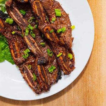 Satay Grill - Beef short ribs marinated over 24 hours with asian BBQ flavour. - Do-It-Yourself Food Near Me - Calgary, Alberta Satay Grill - Beef short ribs marinated over 24 hours with asian BBQ flavour. - Do-It-Yourself Food Near Me - Calgary, Alberta