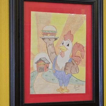 Lucy Kat's Diner - A rooster server, serving a burger. - Diners Near Me - Roanoke, Virginia