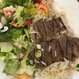 Lamb feast with a salad and rice Lamb feast with a salad and rice
