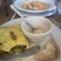 Shrimp and grits and sausage mushroom omelet. Shrimp and grits and sausage mushroom omelet.