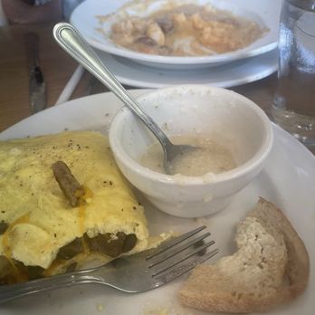 Famous Toastery - Shrimp and grits and sausage mushroom omelet. - Breakfast & Brunch Near Me - Fuquay-Varina, North Carolina Famous Toastery - Shrimp and grits and sausage mushroom omelet. - Breakfast & Brunch Near Me - Fuquay-Varina, North Carolina