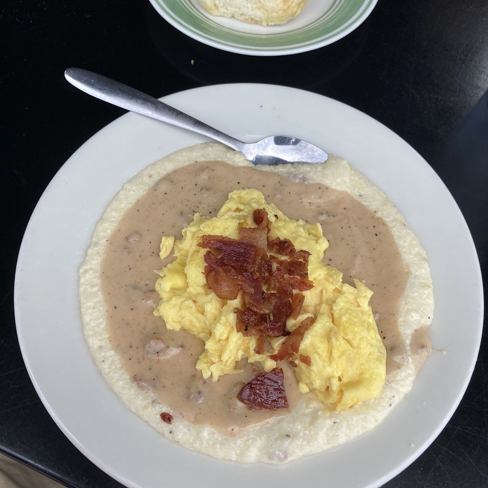 Millstone Biscuit - The Route 17 with bacon, eggs, gravy, and grit. Came with a delicious biscuit. - Breakfast & Brunch Near Me - Murrells Inlet, South Carolina Millstone Biscuit - The Route 17 with bacon, eggs, gravy, and grit. Came with a delicious biscuit. - Breakfast & Brunch Near Me - Murrells Inlet, South Carolina