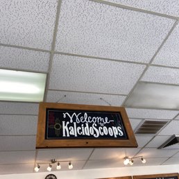 a sign hanging from the ceiling