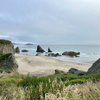 Face Rock State Scenic Viewpoint - Off to the lefthand side of Face Rock Viewpoint, there's a pathway that leads down to the beach. - Landmarks & Historical Buildings Near Me - Bandon, Oregon
