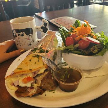 Leopold’s Tavern -  Calgary - Fresh coffee in a cow mug, donnair with a green salad - Beer Bar Near Me - Calgary, Alberta