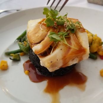 Seasons 52 - Seabass over organic black rice - New American Near Me - Costa Mesa, California