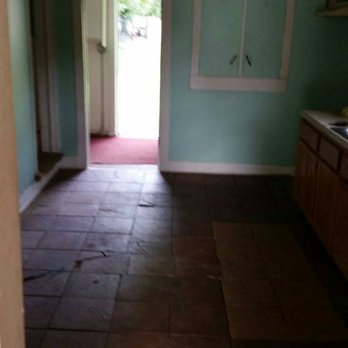 Foss Construction - Before this was old cracked tile that had to be tore up and replaced with beautiful hardwood - General Contractors Near Me