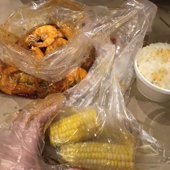 The Captain's Boil - Hand for comparison. TINY! - Seafood Near Me - Toronto, Ontario