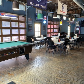 Doc’s Icehouse - a pool table in the foreground - Sports Bars Near Me - Franklin, Texas Doc’s Icehouse - a pool table in the foreground - Sports Bars Near Me - Franklin, Texas