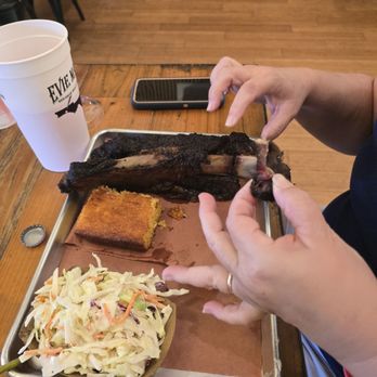 Evie Mae’s - Beef Rib with cornbread and slaw - Caribbean Near Me - Miramar Beach, Florida Evie Mae’s - Beef Rib with cornbread and slaw - Caribbean Near Me - Miramar Beach, Florida