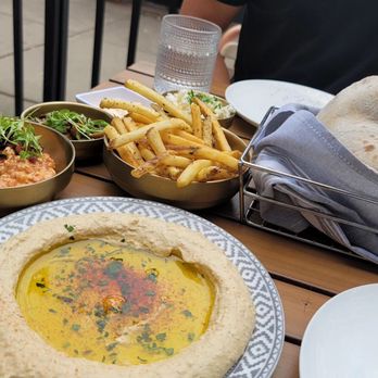 Ash'Kara - Hummus (with the mushroom and feta cheese add on), fries, and.... can't remember the red dish - Mediterranean Near Me - Denver, Colorado