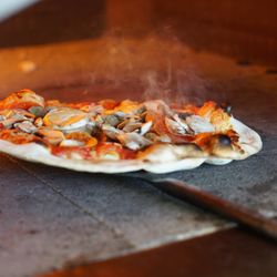 Massimo's - Tasty pizza in the oven