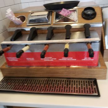 Arby's - a kitchen counter with a bunch of knives on it - Fast Food Near Me - Pigeon Forge, Tennessee