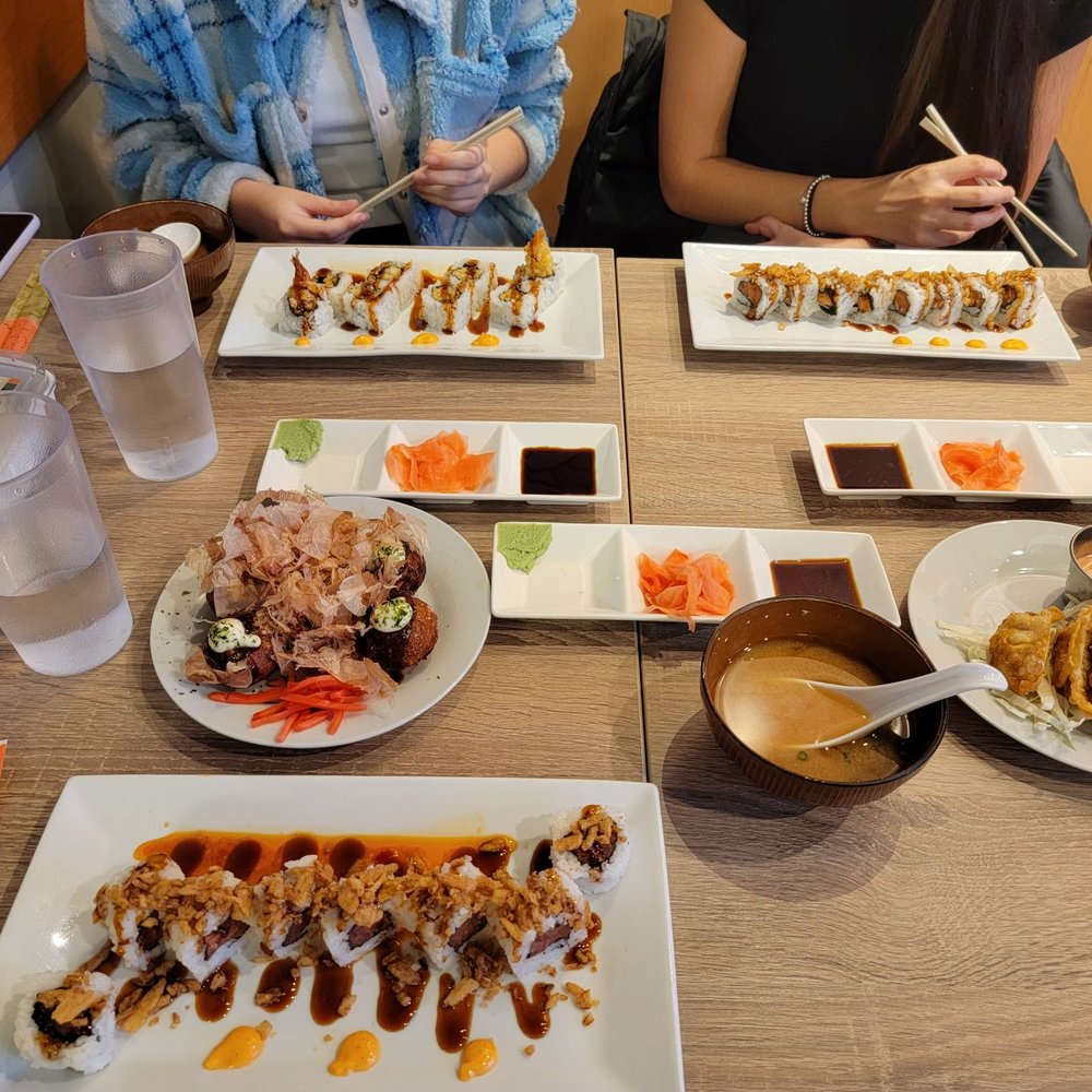 Chicago Sushi - Spicy tuna Crunch Roll (bottom left), Tempura Crunch Roll (top left), Salmon Crunch Roll (top right), Miso Soup, Takoyaki, and Gyoza - Japanese Near Me - Des Plaines, Illinois Chicago Sushi - Spicy tuna Crunch Roll (bottom left), Tempura Crunch Roll (top left), Salmon Crunch Roll (top right), Miso Soup, Takoyaki, and Gyoza - Japanese Near Me - Des Plaines, Illinois