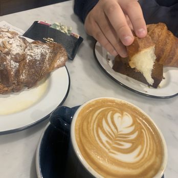 Copper Mug Coffee - Almond croissant, cappuccino, and buttered croissant. - Coffee & Tea Near Me - Brooklyn, New York Copper Mug Coffee - Almond croissant, cappuccino, and buttered croissant. - Coffee & Tea Near Me - Brooklyn, New York